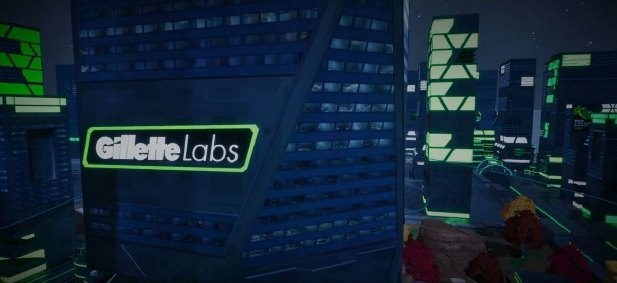 Futuristic cityscape at night, featuring a Gillette Labs building with neon lights.